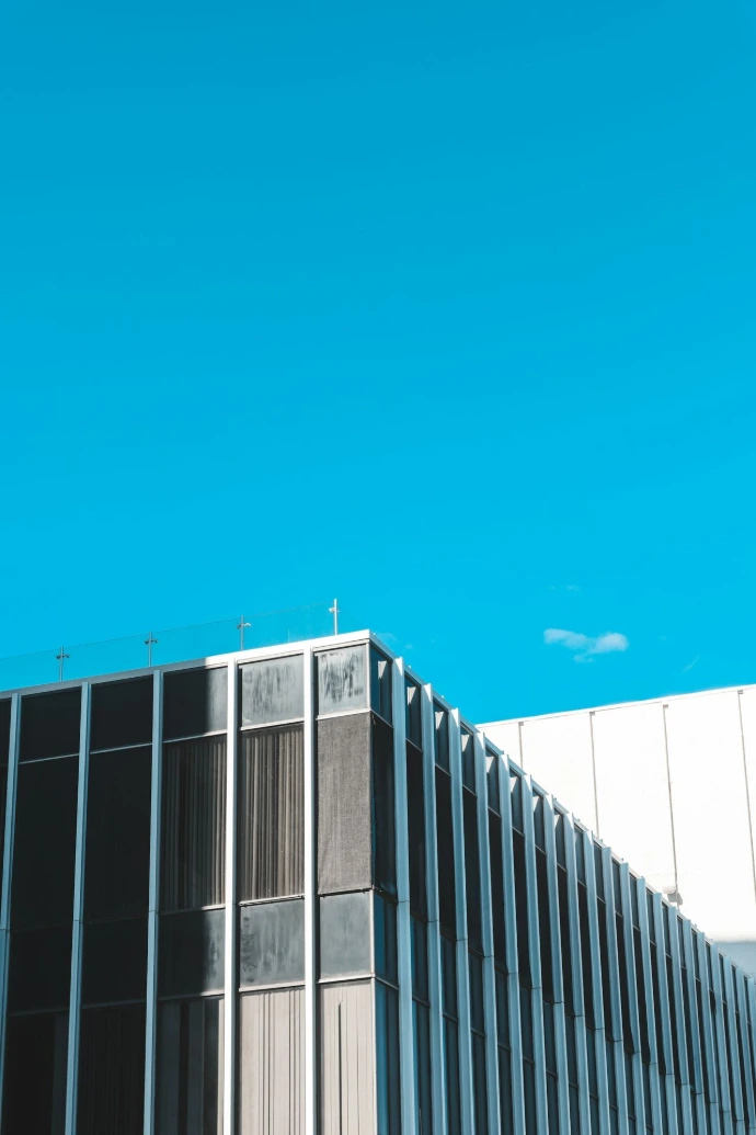 A tall building with a clock on the top of it
